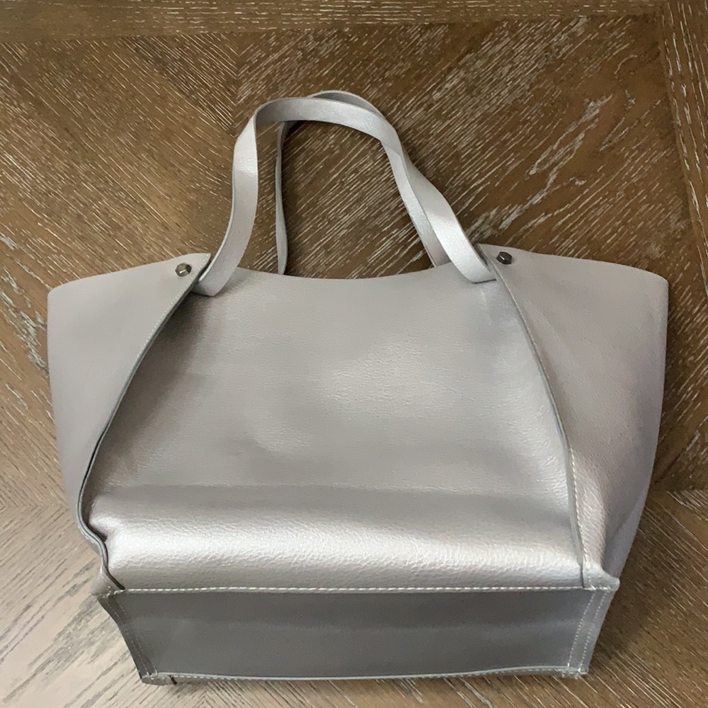 Neiman Marcus silver faux leather with handles tote bag